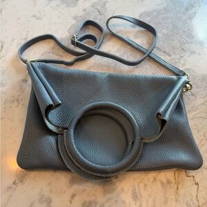 Italian Peddle leather fold over bag with Circle Top Handle